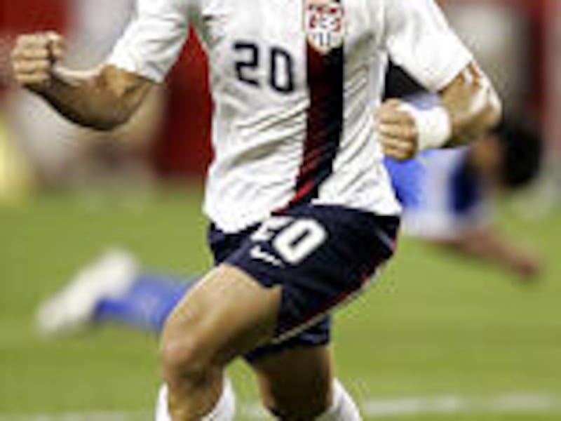 Taylor Twellman of the USA celebrates his goal against El Salvador. The U.S. prevailed 4-0.