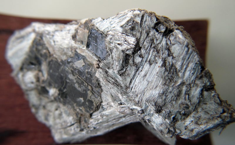This Feb. 18, 2010, file photo shows a sample of tremolite in Libby, Mont. A long-delayed risk study released Monday, Dec. 8, 2014 for the Montana mining town where hundreds have died from asbestos exposure concludes that even a minuscule amount of the substance can lead to lung problems.