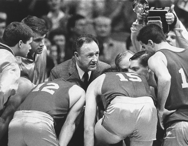 Actor Gene Hackman plays coach Norman Dale during filming of the final game in the movie "Hoosiers" at Hinkle Fieldhouse on the Butler University campus, Friday, Dec. 6, 1985, in Indianapolis. The movie — ranked as the No. 1 sports film of all-time by The Associated Press in 2020 — was released in 1986.