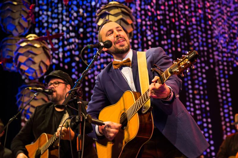 Dominic Moore’s favorite part of the Lower Lights' Christmas concert comes near the very end, when the large group of friends and musicians gather together around a single guitar and invite the audience to sing along with them to “Silent Night.”