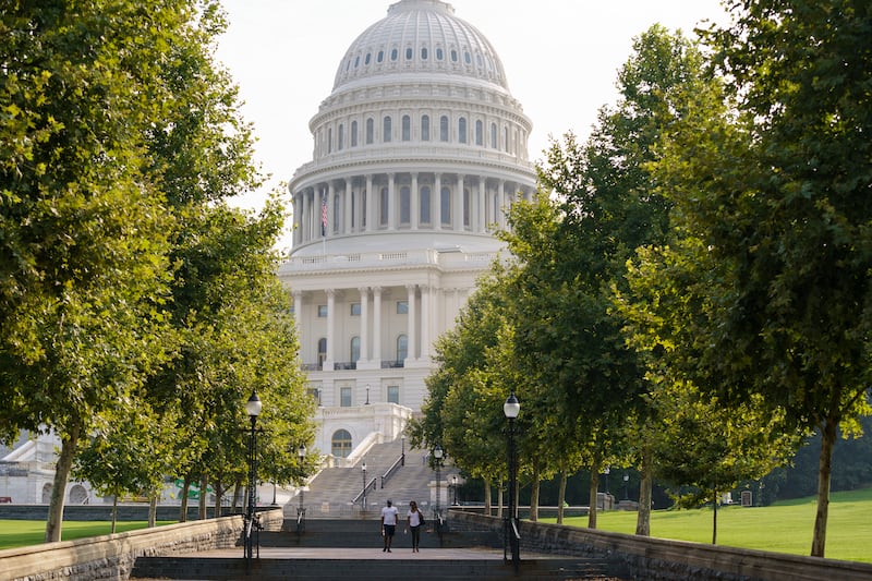 The Capitol is seen amid the haze and humidity of summer in Washington, Thursday, Aug. 26, 2021.