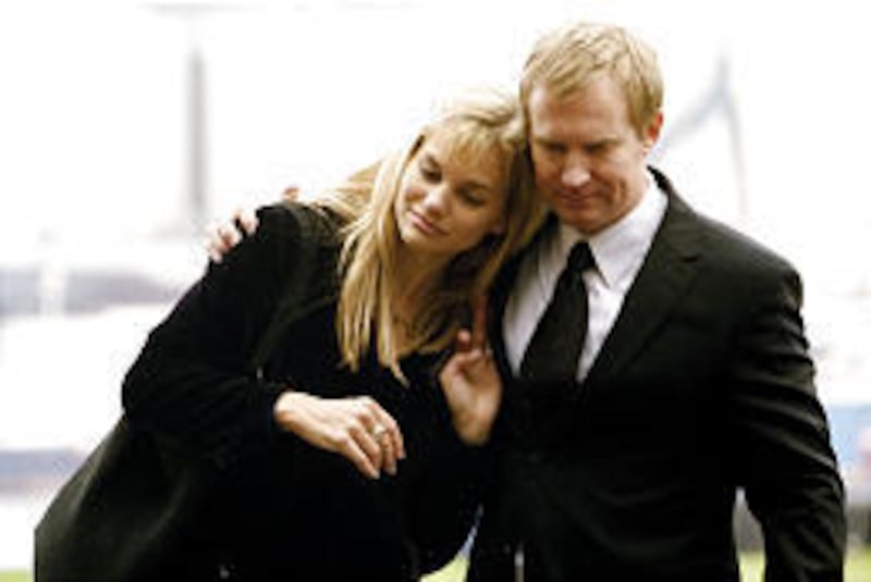 Christoffer (Ulrich Thomsen) and Maria (Lisa Werlinder) attend the funeral of Christoffer's father in Danish-Swedish "The Inheritance."