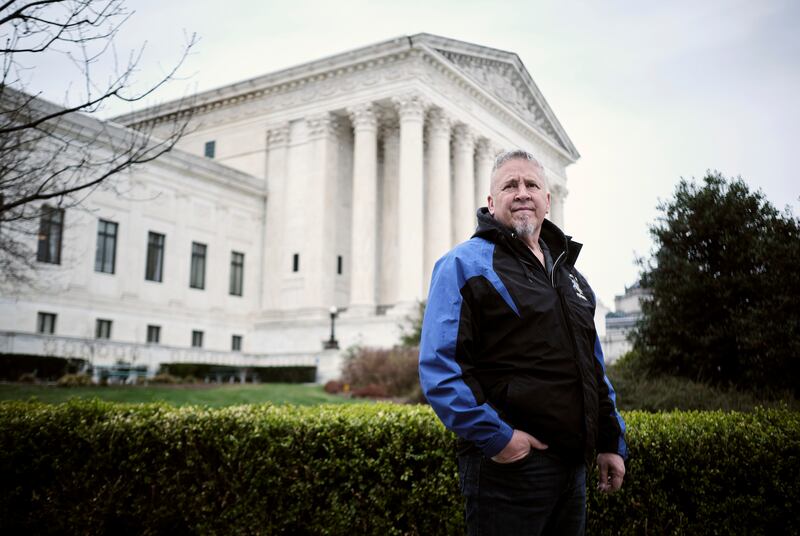 Joe Kennedy, a former assistant high school football coach in Bremerton, Washington, stands outside of the Supreme Court in Washington, D.C., on April 5, 2022.