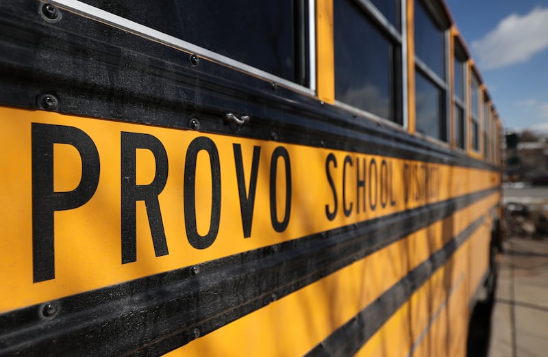 A Provo School District bus is pictured outside of the Capitol in Salt Lake City, on Tuesday, Feb. 7, 2023.