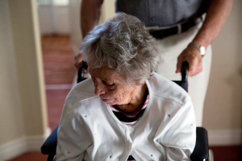 Bill Trowbridge cares for his wife, Kay on Friday, Oct. 6, 2017 in their Orem, Utah home. Kay has been diagnosed with Alzheimer's for several years. Alzheimer’s is often referred to as the silver tsunami, affecting around 30,000 people over the age of 65