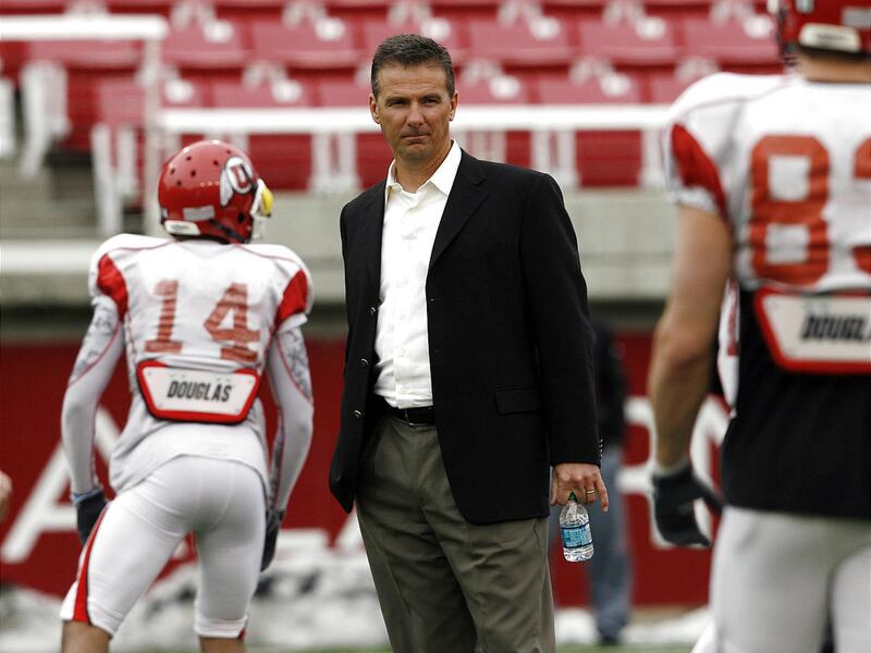 Former Utah football coach Urban Meyer attends the University of Utah football practice at Rice Eccles Stadium in Salt Lake City, Utah, Thursday, March 17, 2011.