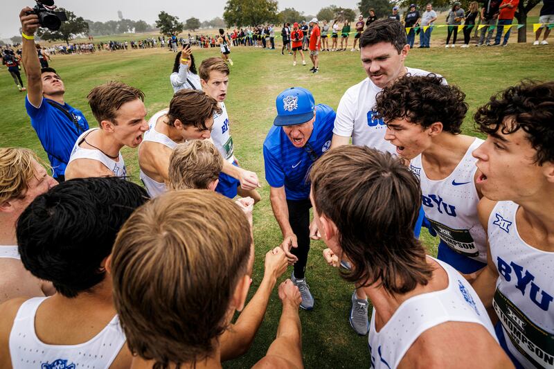 BYU men's cross-country coach Ed Eyestone huddles up with his runners prior to the Big 12 Conference championships Nov. 1, 2024, in Waco, Texas. This week the Cougars will be in Nevada competing in the NCAA regionals.
