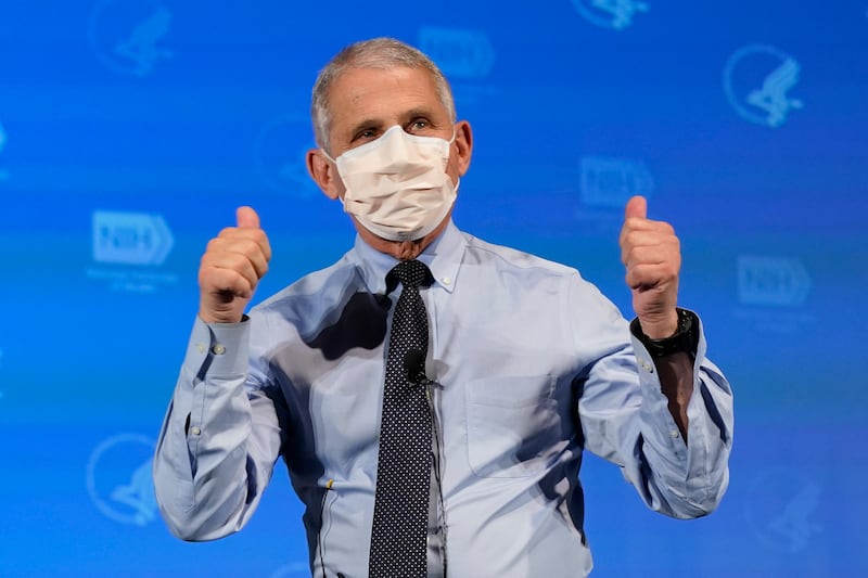 Dr. Anthony Fauci, director of the National Institute of Allergy and Infectious Diseases, gestures after receiving his first dose of the COVID-19 vaccine at the National Institutes of Health, Tuesday, Dec. 22, 2020, in Bethesda, Md.