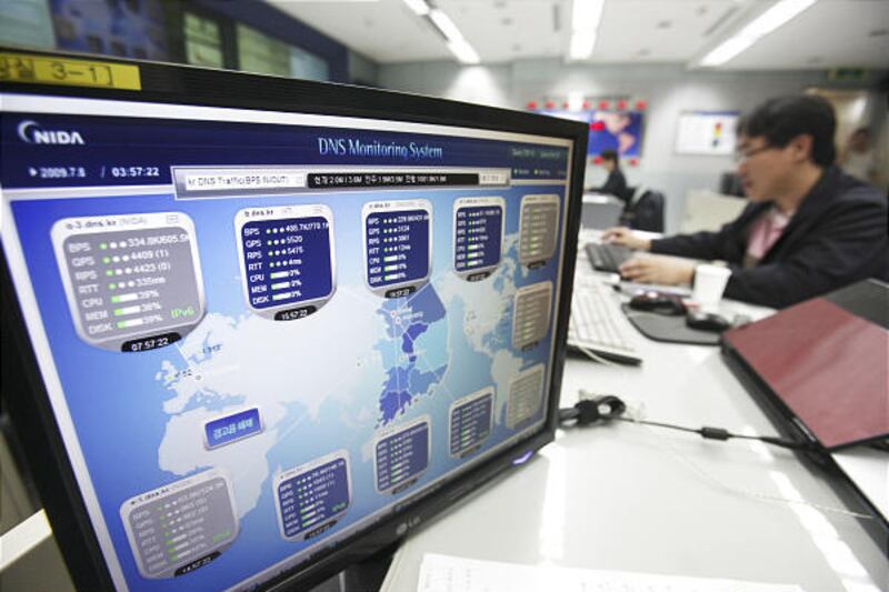 An employee of the Korea Internet Security Center works at a monitoring room in Seoul, South Korea, after a cyber attack.