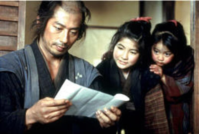Widowed, retired samurai Seibei Iguchi (Hiroyuki Sanada), with his daughters Kyano (Miki Ito) and Ito (Erina Hashiguch) in "Twilight Samurai."