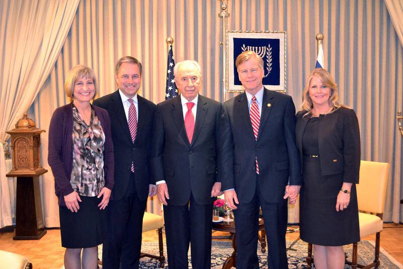 In this photo released by the Alaska governor's office and taken Sunday Nov. 13, 2011, shown from left are; Alaska first lady Sandy Parnell, Alaska Gov. Sean Parnell, Israeli President Shimon Peres, Virginia Gov. Bob McDonnell and Virginia first lady Maur