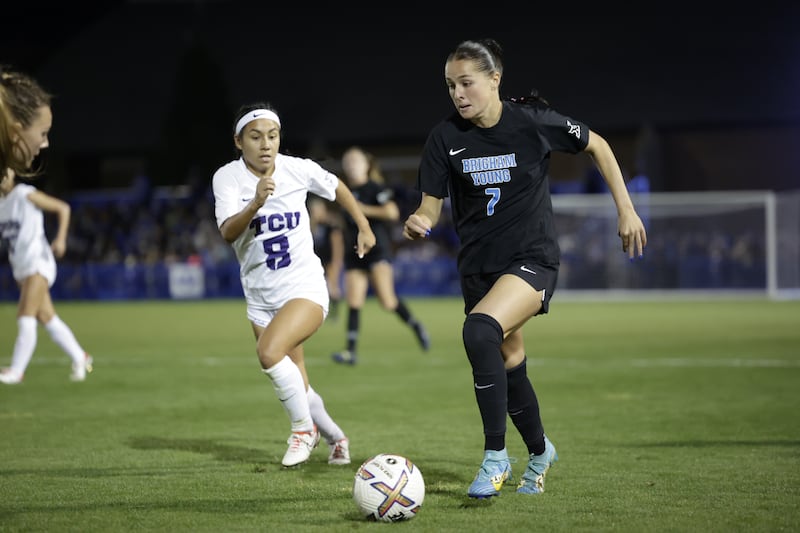 BYU’s Erin Bailey dribbles the ball past TCU’s Oli Pena
