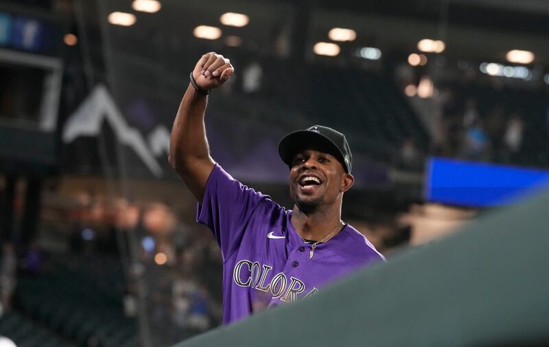 Colorado Rockies’ Wynton Bernard waves at the crowd after a baseball game against the Arizona Diamondbacks Friday, Aug. 12, 2022.
