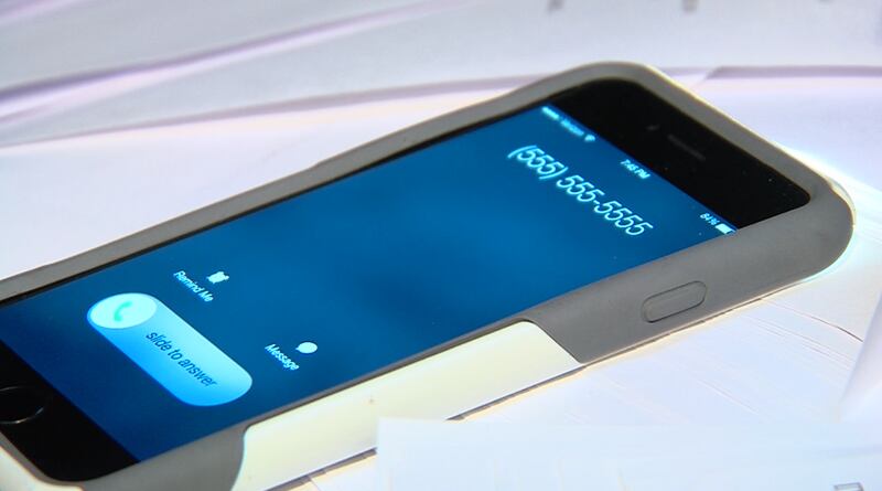 A mobile phone is pictured during a Unified Police Department press conference in March 2016, warning about phone scams.