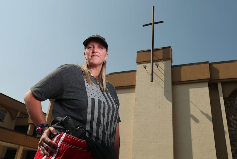Connie Peterson stands outside the Salt Lake Christian Center where she attends church in Millcreek on Wednesday, Aug. 1, 2018. Peterson has a concealed gun during worship.