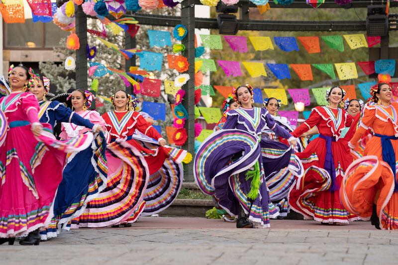 Female performers participate in a traditional dance number for the “Luz de las Naciones,” broadcasting on Nov. 20, 2021.