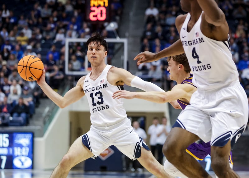 BYU guard Alex Barcello passes to forward Atiki Ally Atiki during game against Northern Iowa in Provo on March 19, 2022.