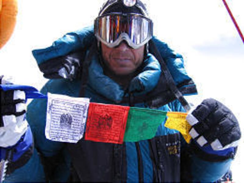 Pediatric neurosurgeon Doug Brockmeyer reaches the summit of Mount Everest on May 30 after three months of climbing.