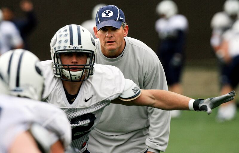 Linebackers coach Paul Tidwell watches during practice as the BYU football team works out in 2007.