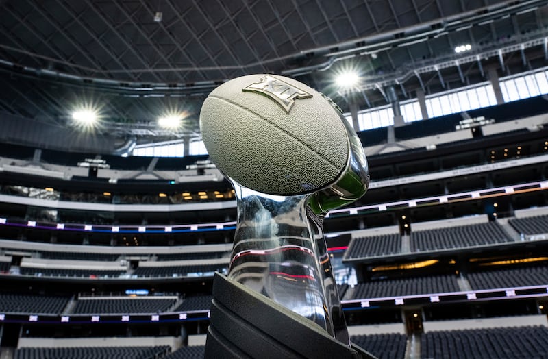 The Big 12 championship trophy is displayed at the opening of the Big 12 football media days in Arlington, Texas.