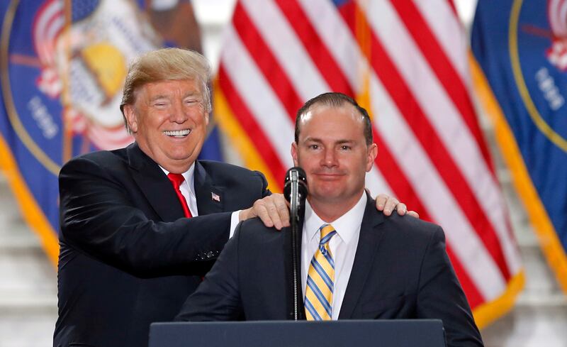 President Donald Trump stands with Sen. Mike Lee, R-Utah, on Dec. 4, 2017, at the Utah state Capitol. 