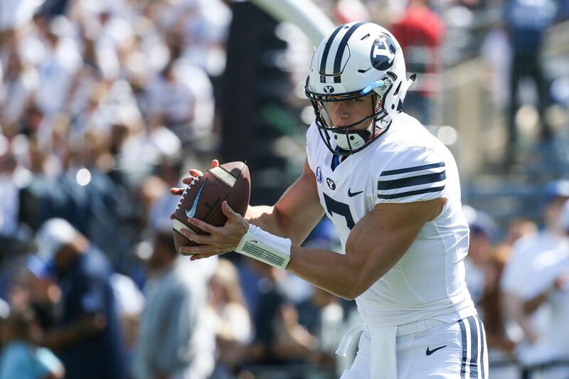Brigham Young Cougars quarterback Beau Hoge (7) wamrs up before the game against the Wisconsin Badgers at LaVell Edwards Stadium in Provo on Saturday, Sept. 16, 2017.