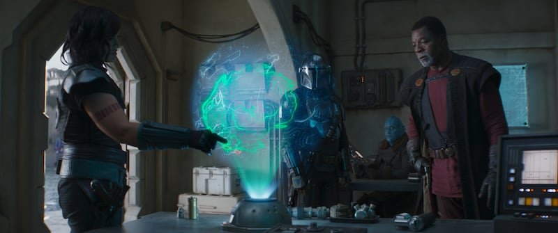 Greef Karga (Carl Weathers), Cara Dune (Gina Carano) and the Mandalorian (Pedro Pascal) and mythrol (Horatio Sanz) in “The Mandalorian.”