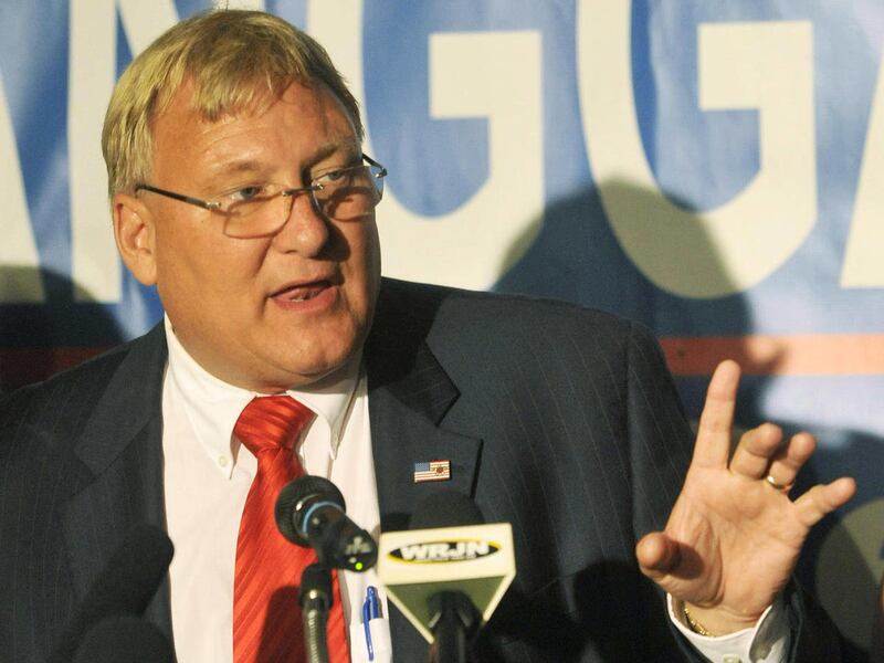 In this June 6, 2012, photo Wisconsoin state Sen. Van Wanggaard speaks to the crowd as they wait for recall election results in Racine, Wis. Wanggaard said Tuesday, July 10, 2012, he will not challenge his loss in last month's recall election, effectivel