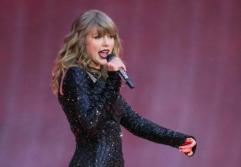 In this June 22, 2018, file photo, singer Taylor Swift performs on stage in concert at Wembley Stadium in London.