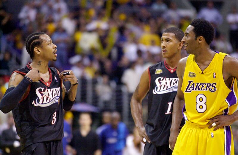 Allen Iverson, who wore a Kobe Bryant jersey to the event, shared a hug with Wader after the pregame tribute. In this Friday, June 8, 2001, file photo, Philadelphia 76ers’ Allen Iverson, left, argues with the Los Angeles Lakers’ Kobe Bryant at the end of Game 2 of the NBA Finals in Los Angeles, as 76ers’ Raja Bell looks on at rear.