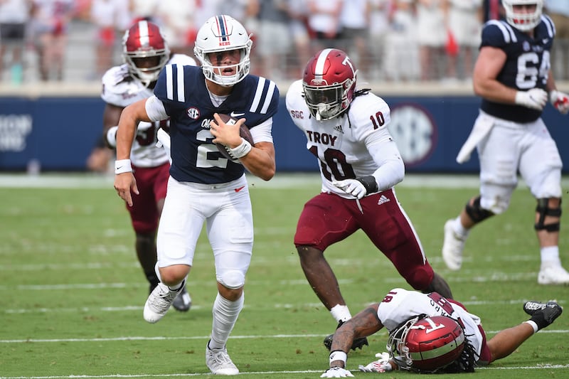 Mississippi quarterback Jaxson Dart (2) runs the ball during the first half an NCAA college football game against Troy in Oxford, Miss., Saturday, Sept. 3, 2022.