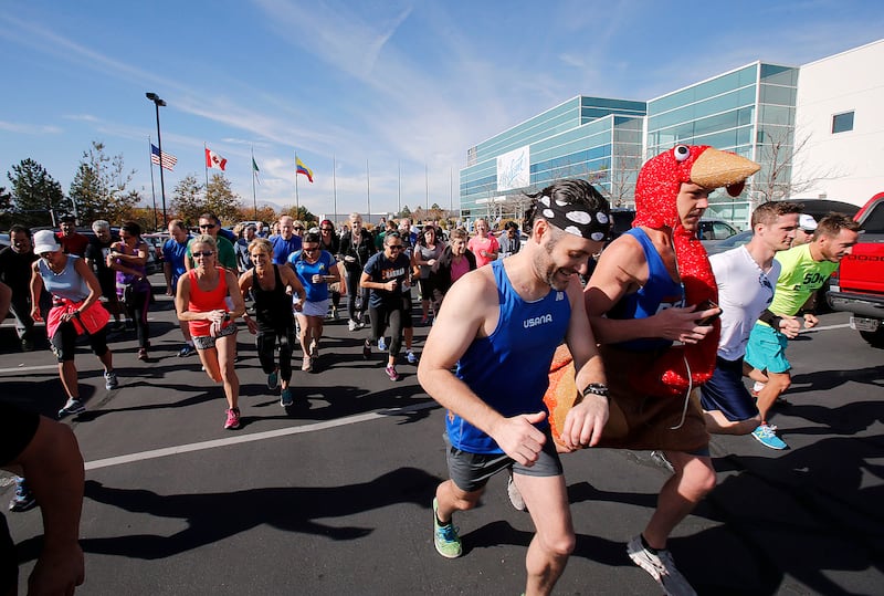 Runners start the USANA Turkey Trot 5K in Salt Lake City on Nov. 6, 2014.