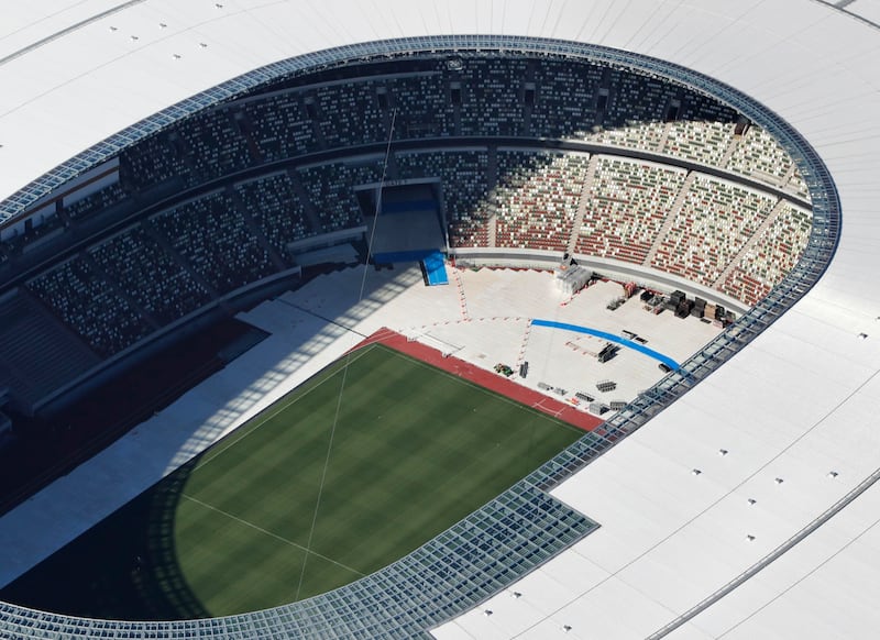 This aerial photo shows the National Stadium, a venue for the opening and closing ceremonies at the Tokyo 2020 Olympics, in Tokyo, Feb. 16, 2021. The Tokyo Olympics will ban overseas spectators due to COVID-19 risks.