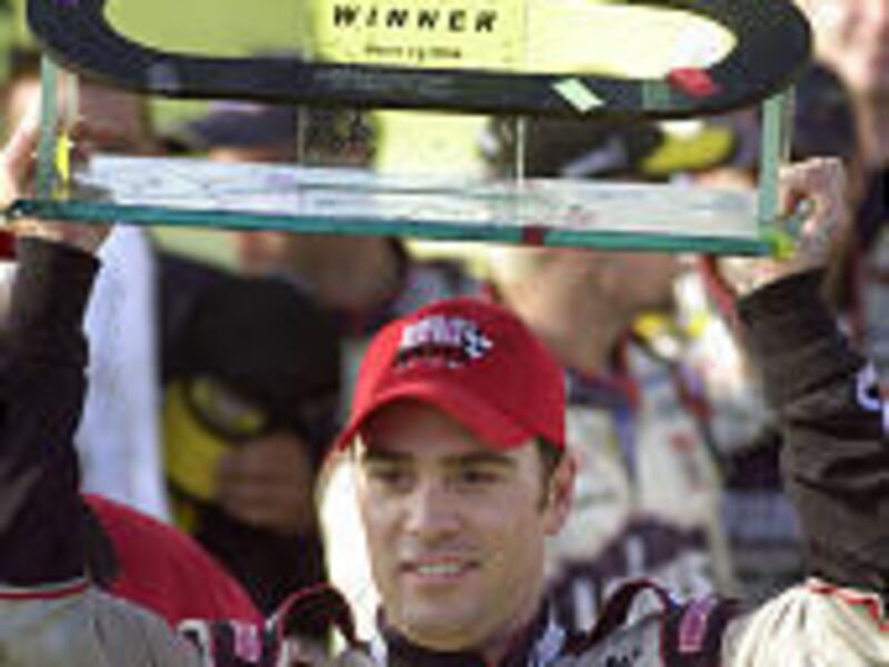 Jimmie Johnson celebrates victory at the Carolina Dodge Dealers 400.