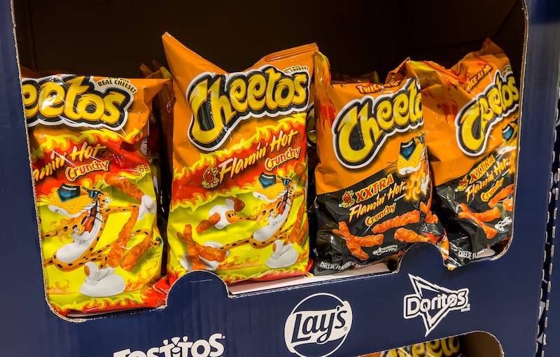 Flaming hot Cheetos are pictured. Cheetos has announced the release of a pair of Cheetos Pretzels flavors.