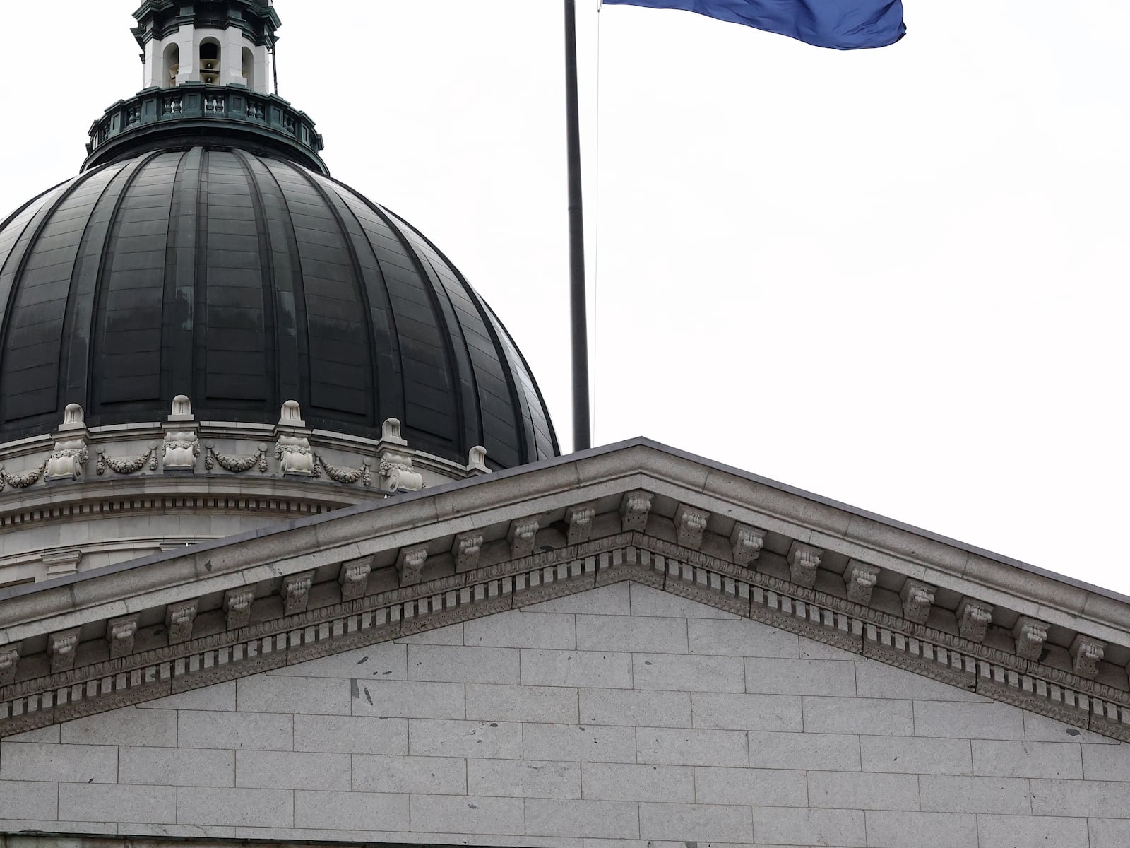 The Utah flag flies over the Capitol in Salt Lake City on Friday, Jan. 22, 2021.