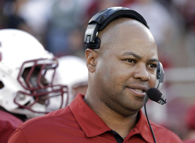 Stanford coach David Shaw watches an NCAA college football game against Washington in Stanford, Calif., Oct. 22, 2011.