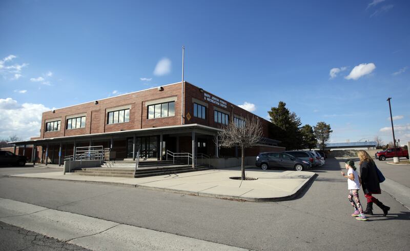 FILE - Patrons walk into the Marv Jenson Recreation Center in South Jordan on Monday, March 19, 2018. The decades-old Marv Jenson Recreation Center named after a now-deceased boxing legend and local politician will shutter once and for all in less than a