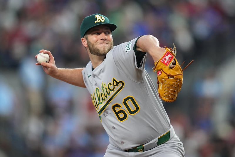 Athletics pitcher Justin Sterner throws to the Texas Rangers during the sixth inning during game Sunday, April 26, 2026, in Arlington, Texas.