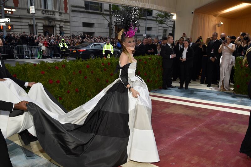 Sarah Jessica Parker in gingham ball gown poses for photos