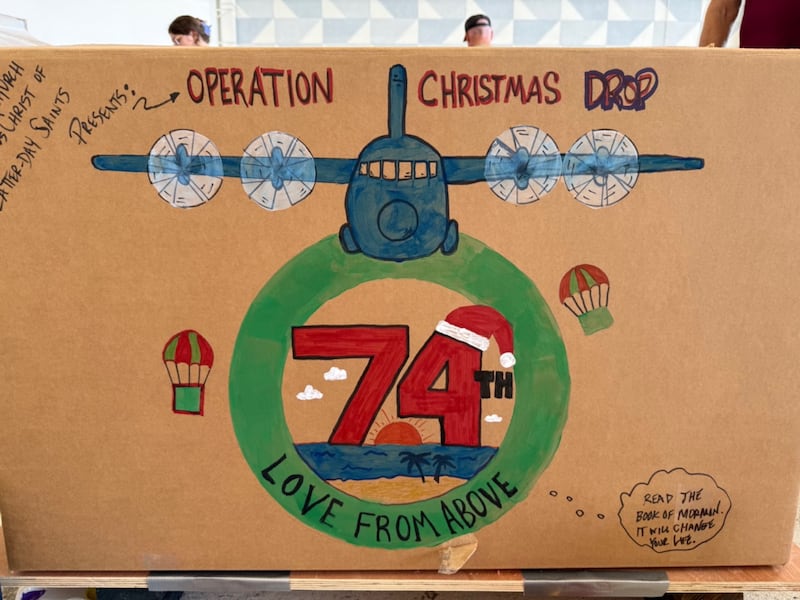 A box at Andersen Air Force Base stands ready to be dropped as part of Operation Christmas Drop in Micronesia on Dec. 5, 2025.