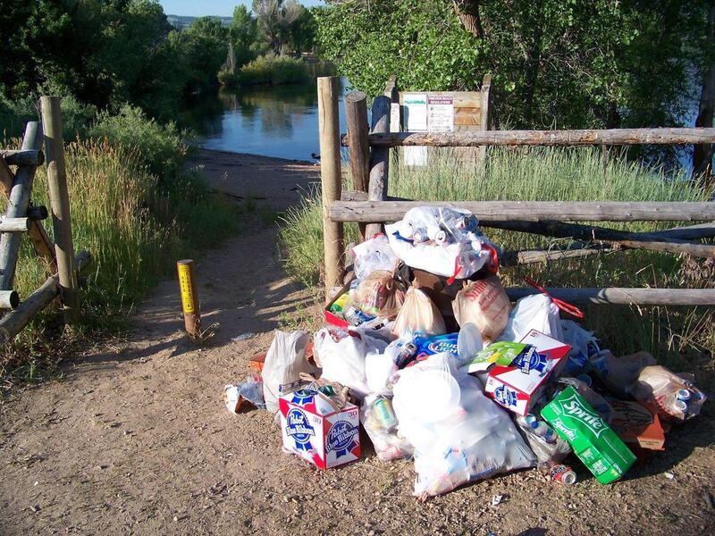 Garbage is piled up outside a gate leading to Pineview Reservoir near Ogden. The Uinta-Wasatch-Cache National Forest is encouraging the public to join its second annual Adopt-a-Beach at Pineview and Causey reservoirs.