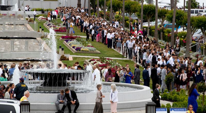 Youth wait in line to attend a devotional at the Interstake Center on the Oakland California Temple grounds on Saturday, June 15, 2019.
