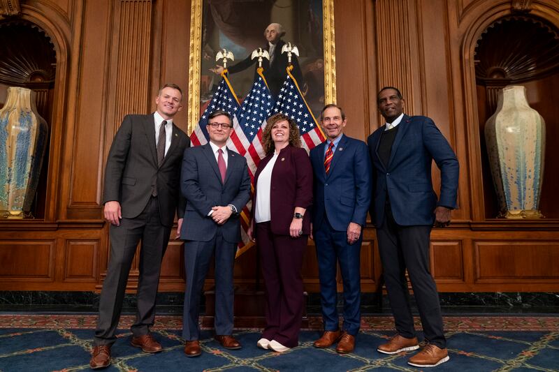 Utah Representatives and Speaker of the House Mike Johnson stand for a portrait on Capitol Hill in Washington.