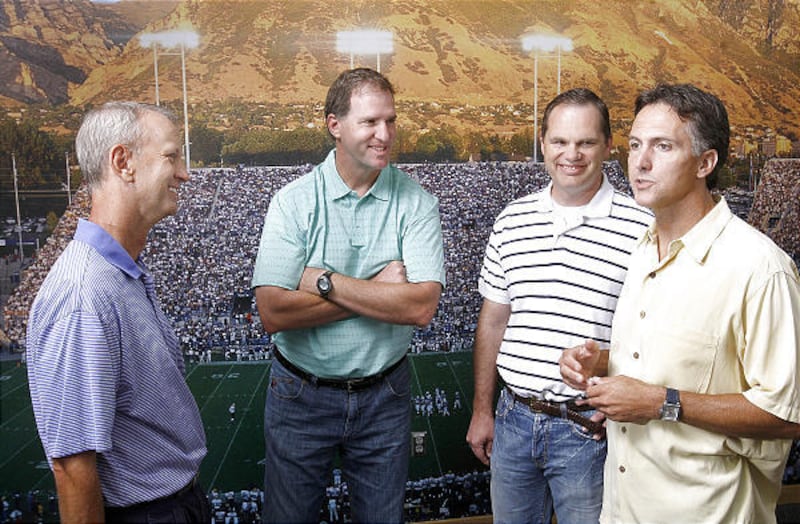 Left to right; Robbie Bosco, Tim Herrmann, Marv Allen and Kyle Morrell, members of the BYU 1984 National Championship football team, in July.