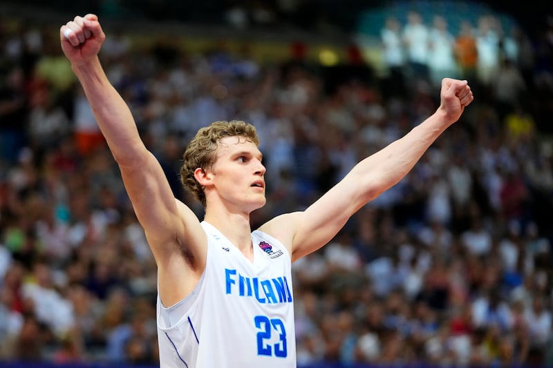 Finland’s Lauri Markkanen celebrates after winning during the Eurobasket group D basketball match between Czech Republic and Finland in Prague, Czech Republic, Tuesday, Sept. 6, 2022. (AP Photo/Petr David Josek)