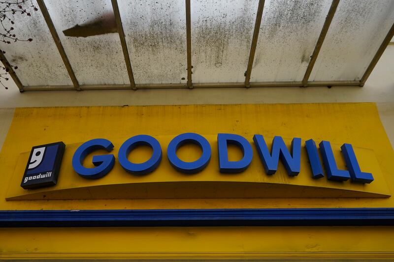 The sign to a closed Goodwill store is shown in Berkeley, Calif.