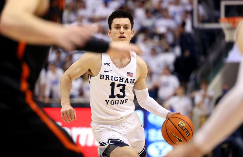 BYU guard Alex Barcello looks for an open teammate during game against Pacific at the Marriott Center, Jan. 6, 2022.