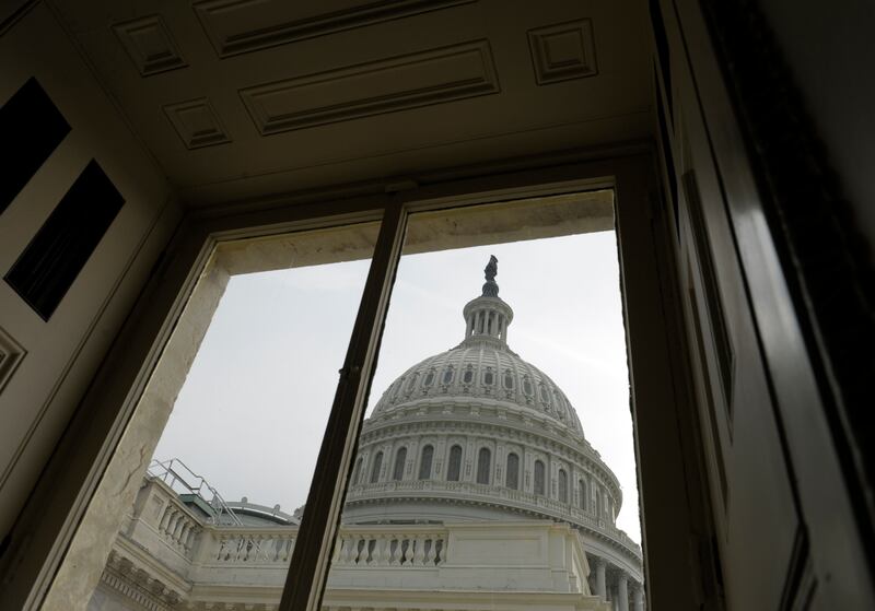 This Friday, Dec. 28, 2012, file photo shows The Capitol dome on Capitol Hill in Washington is pictured on Friday, Dec. 28, 2012. The brinkmanship in Washington over taxes and spending is likely to continue damaging the fragile economy well into 2013. The political standoff has already taken an economic toll, creating uncertainty about the future and discouraging consumers from spending and businesses from hiring and investing. (AP Photo/Susan Walsh, File) Susan Walsh AP DEC. 28, 2012, FILE PHOT