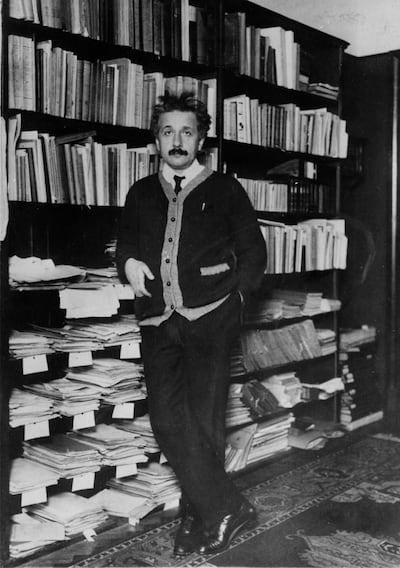 Dr. Albert Einstein is photographed in his office in Berlin in the early 1920s.